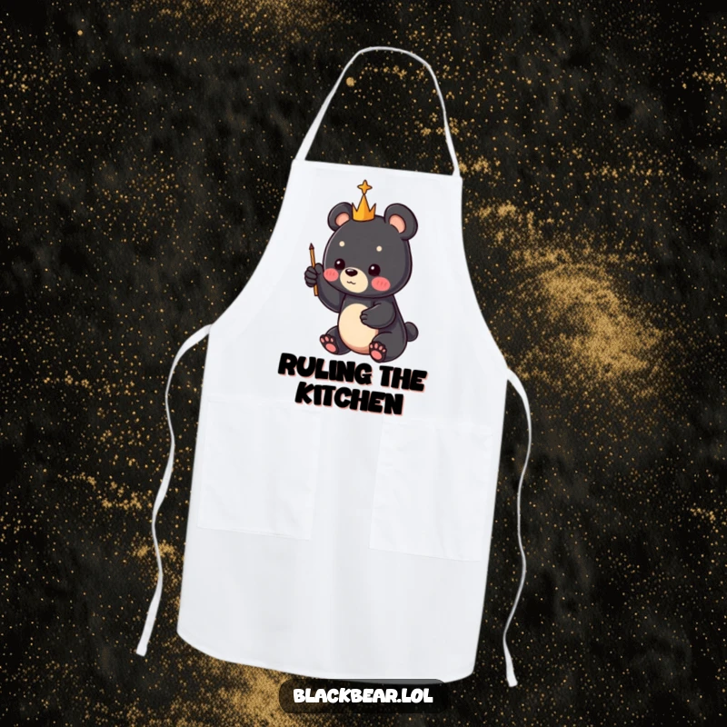 Funny black bear cub wielding a tiny scepter, pointing to the sky, on a cooking apron, a perfect funny gift.
