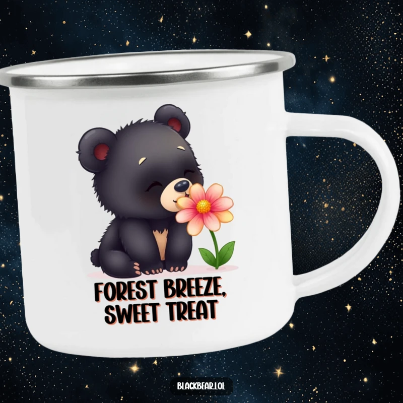 Funny camping mug showing a curious young black bear cub pausing to sniff a beautiful, vibrant flower during its outdoor adventure.