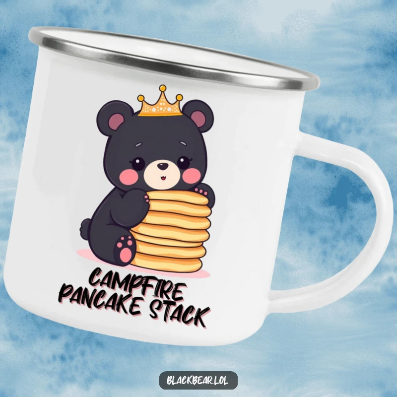 Funny crowned black bear cub balances a stack of pancakes, perfect for outdoor meals on this camping mug.