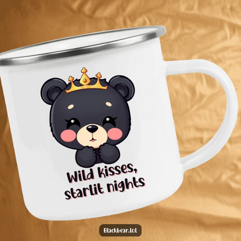 Funny black bear cub camping mug, a cub in a sparkly crown blowing a kiss downwards, perfect for adding sweet humor outdoors.