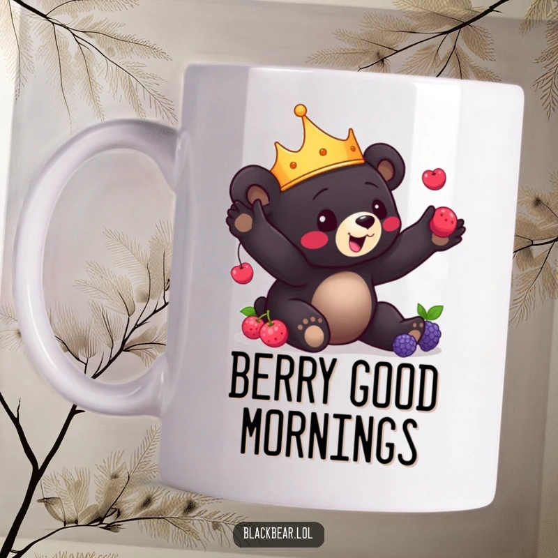 Funny Bear Cub Mug: A charming black bear cub wearing a crown playfully juggles berries, showing off its delightful skills.