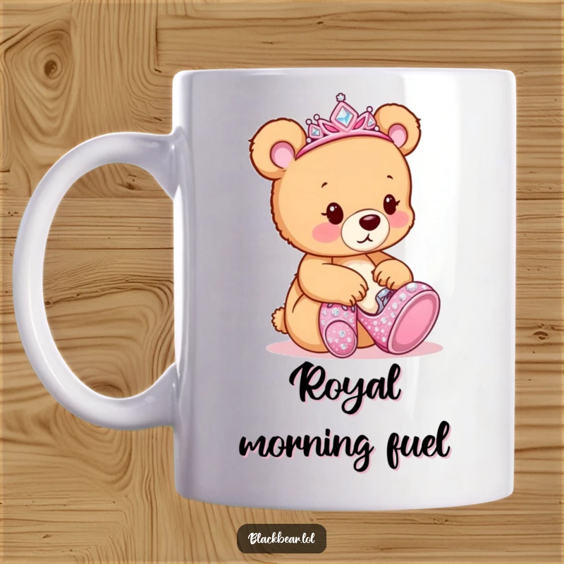 Funny Mug: Bear cub wearing a tiara, trying on oversized, sparkly high-heeled shoes with curiosity.