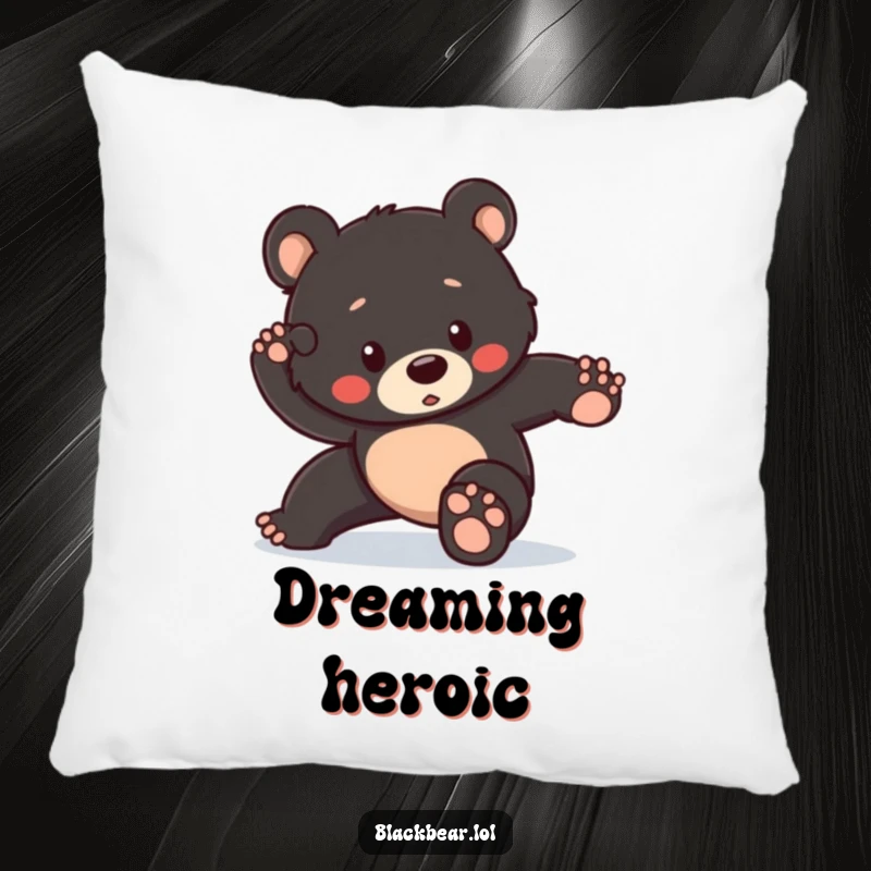 Funny pillow featuring a black bear cub attempting a heroic pose but tripping slightly, offering comfort and humorous encouragement.