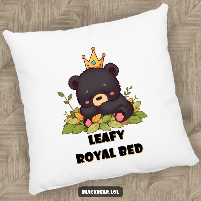 Funny crowned black bear cub napping peacefully in leaves, adding a humorous and calming touch to this pillow.