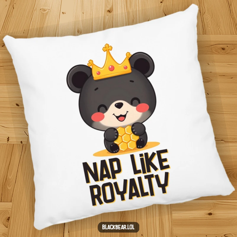 Funny pillow featuring a charming black bear cub in a miniature crown, balancing a honeycomb on its nose, offering soft, cheerful decor.