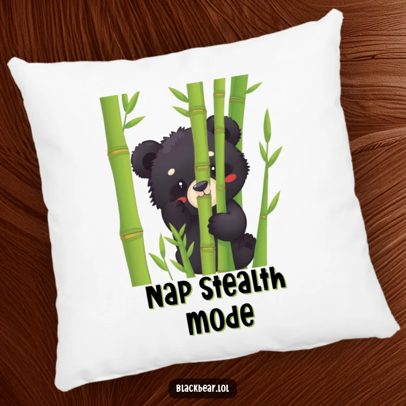 Funny black bear cub pillow peeking from bamboo, providing a soft, humorous accent for couches and beds.