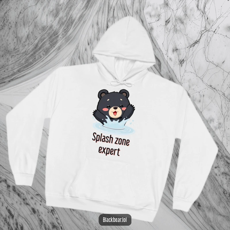 Funny Hoodie: A black bear joyfully splashes in a puddle, embodying pure delight and outdoor fun.