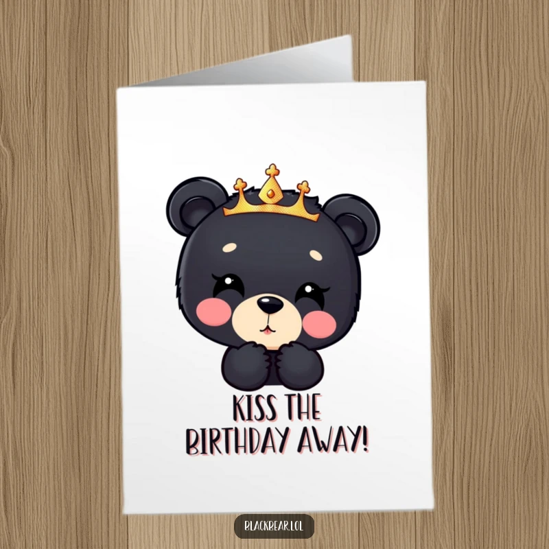 Funny Free Printable Birthday Card: Black bear cub in sparkly crown blows a kiss downwards with love.