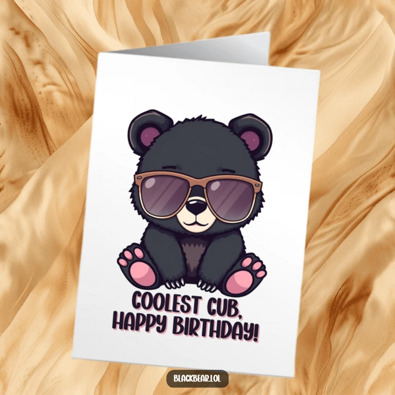 Funny Free Printable birthday card: a black bear cub looking incredibly cool, sporting a pair of oversized, dark sunglasses.