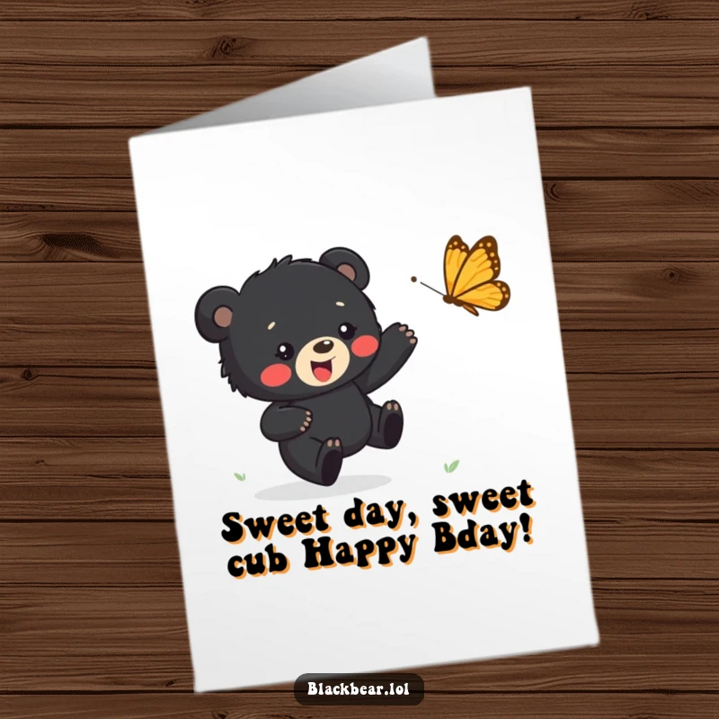 Funny Free Printable Birthday Card: Cute black bear cub joyfully chasing a colorful, bouncing butterfly, perfect for birthdays.