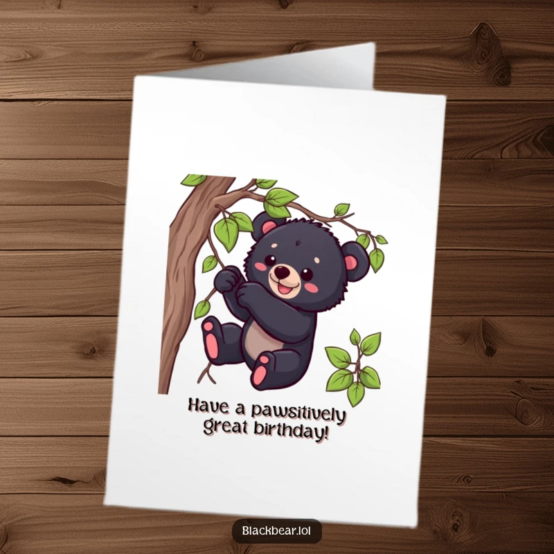 Funny free printable birthday card: a cute black bear cub playfully tugs on a dangling green vine.