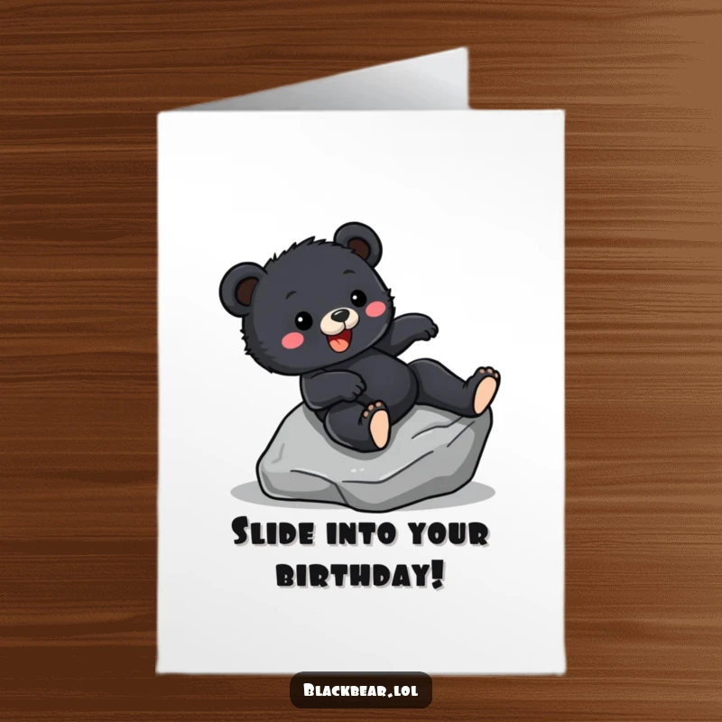 Funny Free Printable Birthday Card: An excited black bear cub gleefully slides down a smooth, wet rock.