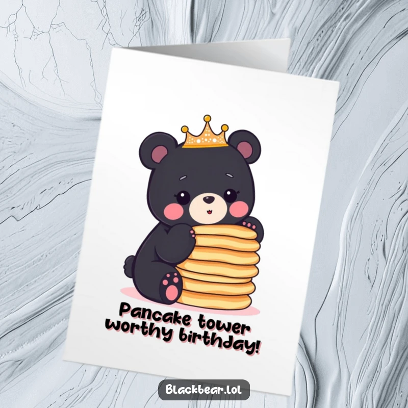 Funny Free Printable Birthday Card: Black bear cub in sparkly crown precariously balances a tall stack of pancakes.
