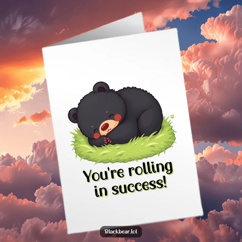 Cheerful free printable congratulations card showing a black bear cub joyfully tumbling in a soft, green mossy patch.