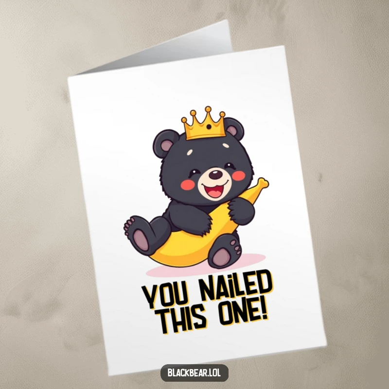Funny Free Congratulations Card: Black bear cub wearing a crown slips hilariously on a banana peel.