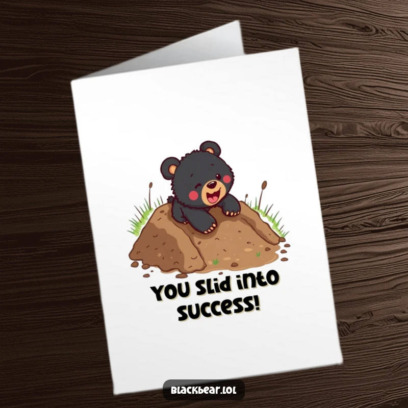 Funny Free Printable Congratulations Card: Black bear cub covered in mud, sliding down a hill triumphantly.