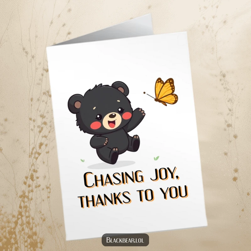 Funny Free Printable Thank You Card: A playful black bear cub happily chasing a butterfly captures sweet gratitude.