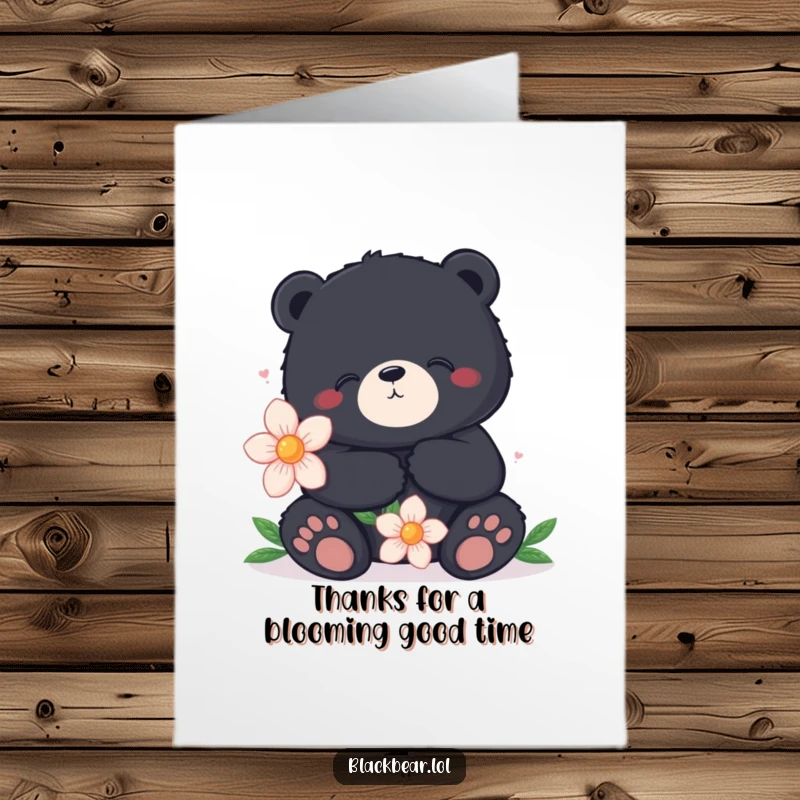 Funny Free Printable Thank You Card: A black bear sits contentedly holding a large flower to convey thanks.