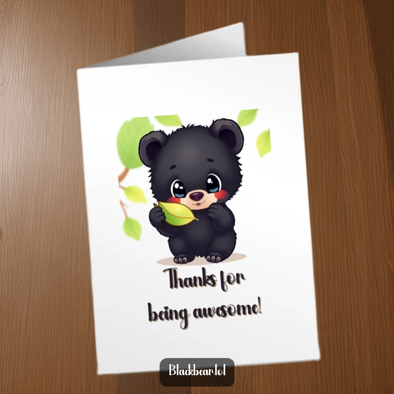 Sweet free printable thank you card depicting a black bear cub intently studying a glistening leaf with curious, large eyes.