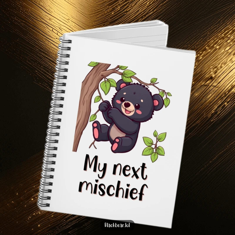 Funny black bear cub notebook with a playful cub tugging on a vine, perfect for journaling and creative notes.