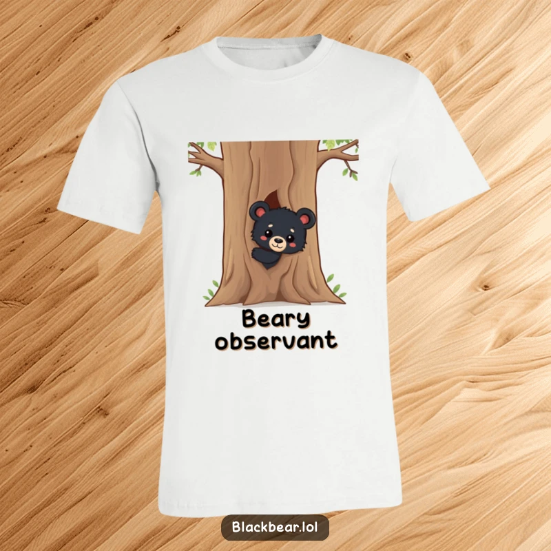 Funny Black Bear Cub T-Shirt: A charming, curious black bear cub peeks from behind a tree, capturing the thrill of discovery in a fun, wearable design.
