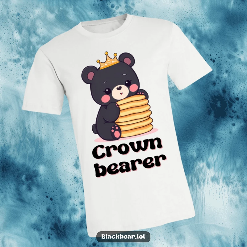 Funny black bear cub royalty in a sparkly crown balances a precarious stack of pancakes on this fun t-shirt.