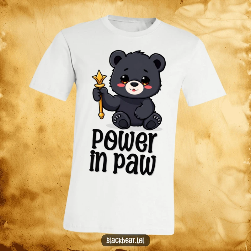 Funny black bear cub t-shirt holding a shiny scepter with a paw, a powerful and humorous graphic.