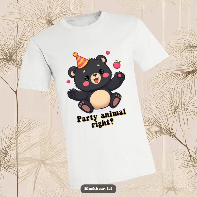 Funny T-Shirt: Adorable black bear cub sporting a party hat, energetically juggling a cascade of colorful berries, full of playful spirit.