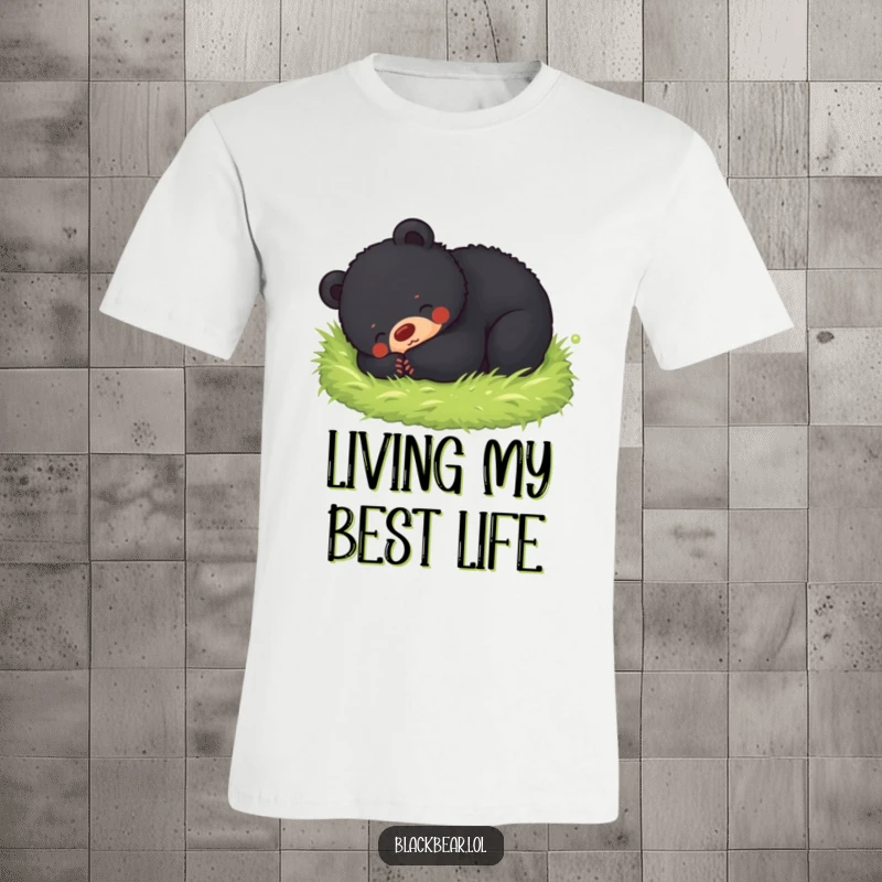 Funny t-shirt depicting a black bear cub rolling happily in soft moss, embodying pure joy and a love for cozy comfort.