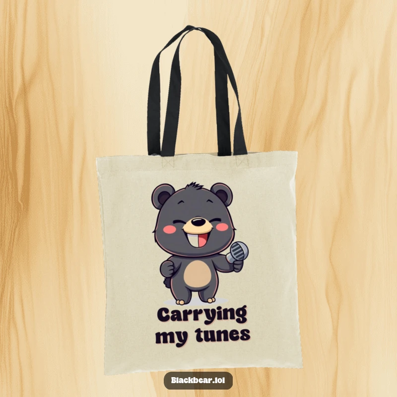 Funny tote bag featuring a black bear cub with a mischievous grin, confidently holding a microphone.
