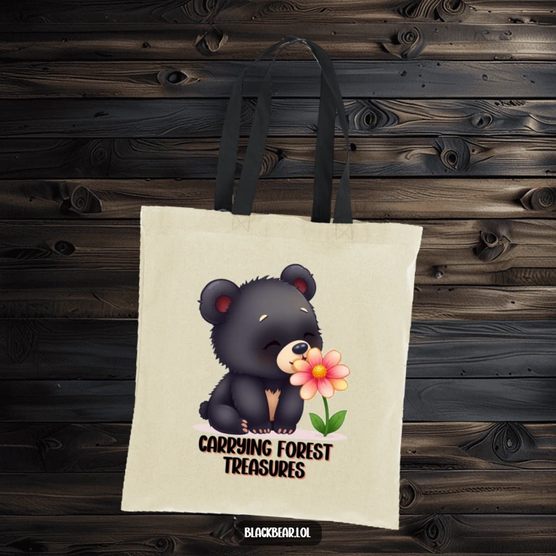 Funny tote bag illustrating a curious young black bear cub captivated by the scent of a beautiful, colorful flower.
