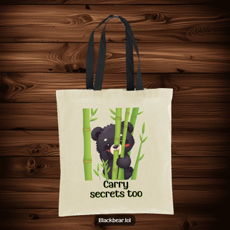 Funny black bear cub tote bag peeking from bamboo, perfect for carrying essentials with a playful and humorous touch.