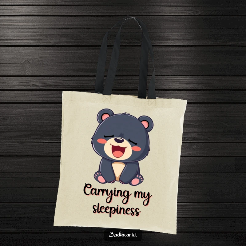 Funny tote bag featuring a sleepy black bear cub yawning with a big, happy smile, perfect for errands.