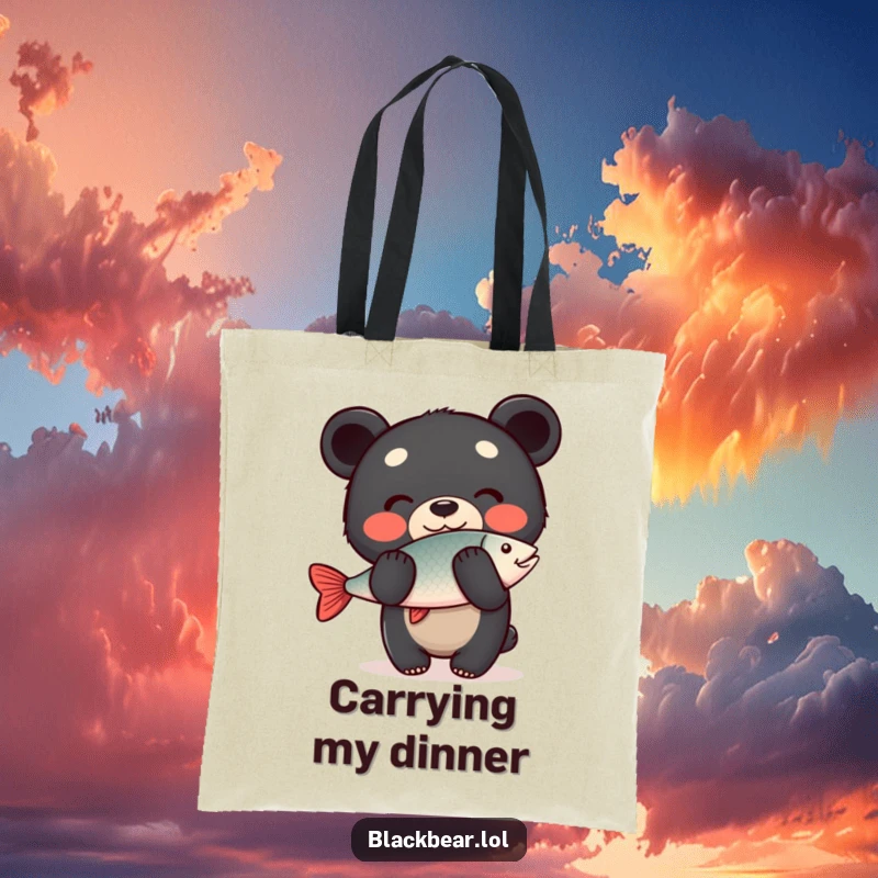 Funny Tote Bag: Happy black bear cub with a grin, balancing a fish on its nose, making it a humorous and practical accessory.